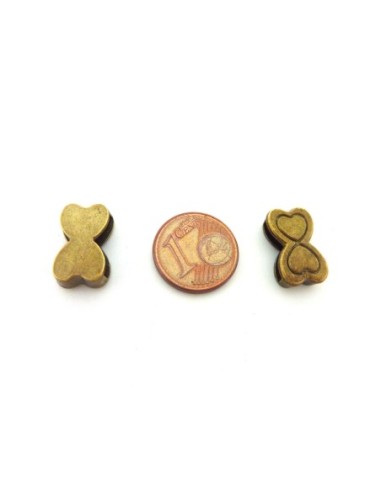 Perle passe cuir noeud bronze pour lanière de 12mm