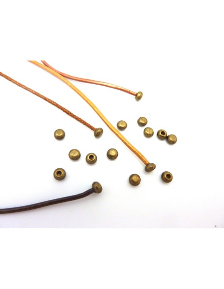 Perle de finition bronze pour cordon cuir de 1,5mm Perle de finition bronze pour cordon cuir de 1,5mm