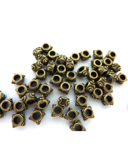 Perle fine bronze travaillé style ethnique 5mm en métal