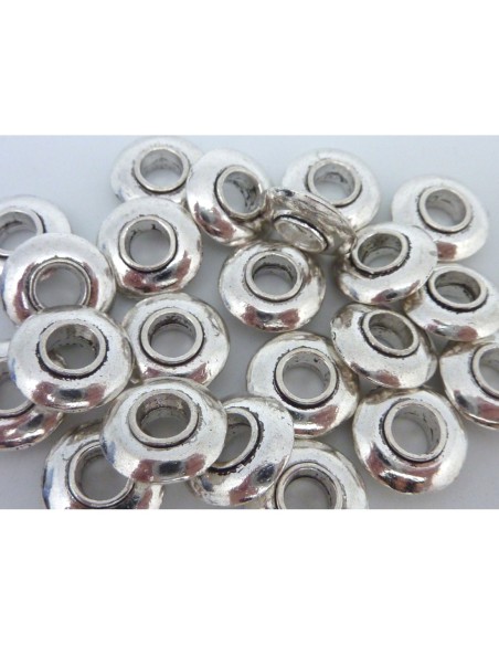 Perle en métal argente biseauté à gros trou