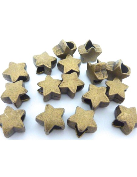 10 Perles étoile 11,5mm en métal de couleur bronze, à gros trou 10 Perles étoile 11,5mm en métal de couleur bronze, à gros trou