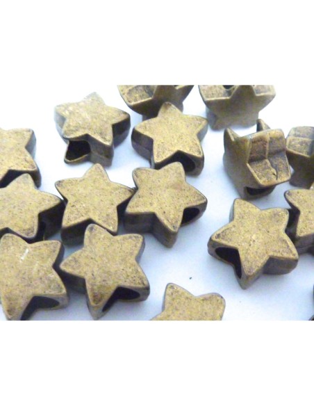 10 Perles étoile 11,5mm en métal de couleur bronze, à gros trou 10 Perles étoile 11,5mm en métal de couleur bronze, à gros trou