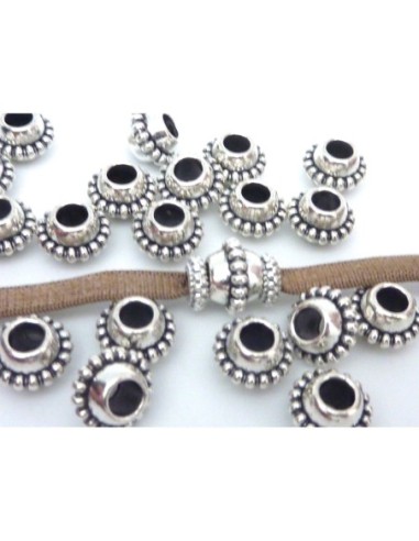 Perle à gros trou argenté style ethnique travaillé