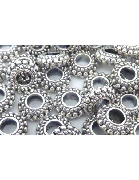 Perle intercalaire 7mm en métal argenté travaillé