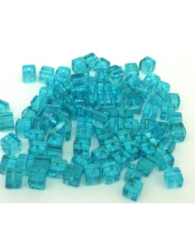 Perle cube en verre bleu turquoise transparent