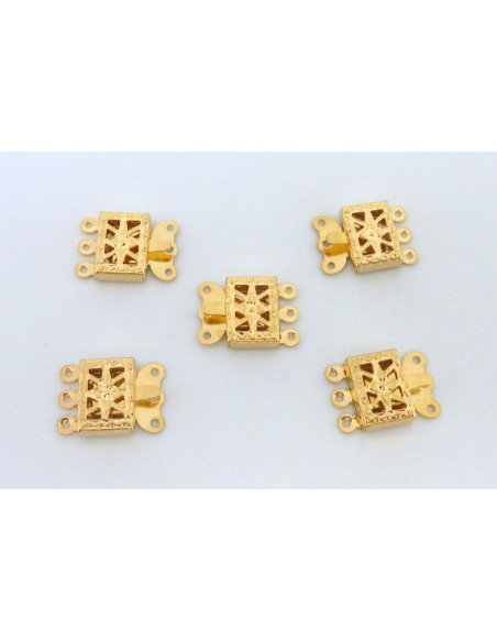 Fermoir en métal doré filigrane