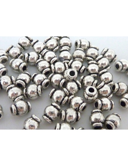 Perle métal argenté toupie 5mm