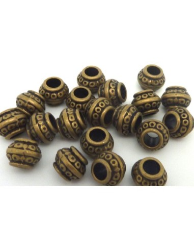 Perle ronde bronze style ethnique en métal pour cordon de 4mm