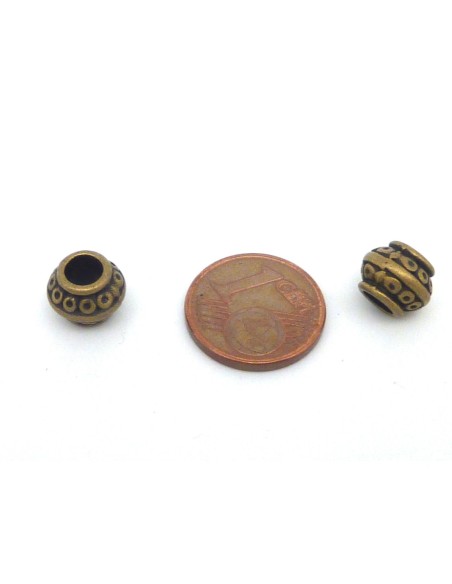 Perle bronze style ethnique 9mm en métal pour cordon de 4mm