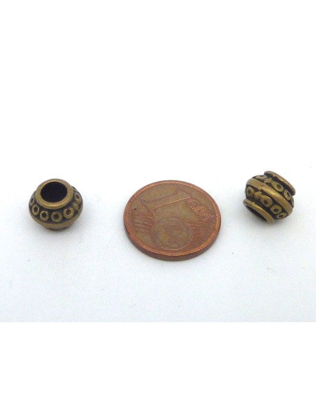Perle ronde bronze style ethnique en métal à gros trou