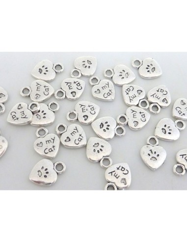 Breloque petit coeur empreinte de chat en métal argenté