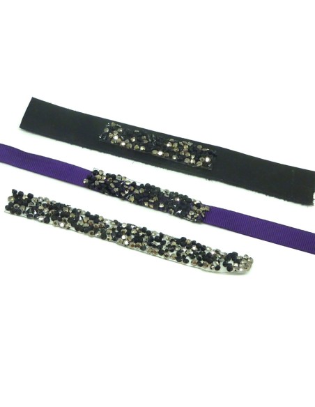 1 bande de 1cm de large sur 11cm de long de strass thermocollant caviar de couleur noir et argenté