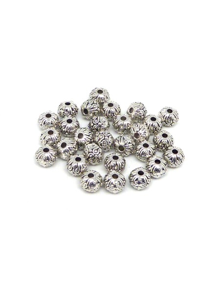 Perle ronde 6mm argenté style ethnique en métal travaillé