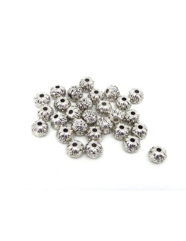 Perle ethnique en métal argenté travaillé 6mm