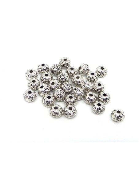 Perle ethnique en métal argenté travaillé 6mm