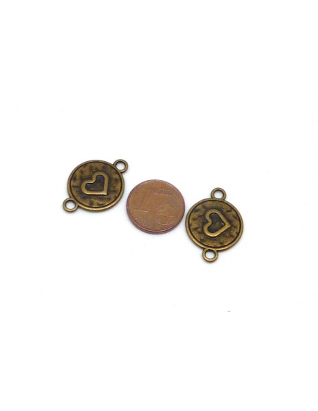 Connecteurs coeur gravé en métal de couleur bronze 22,8mm