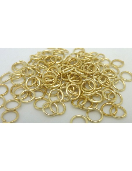 2,8g - environ 50 anneaux de jonction 6mm x 0,7mm en métal de couleur doré pâle