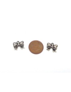 10 Breloques, pendentif noeud en métal argenté 11mm 2