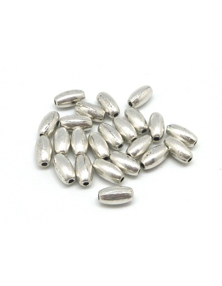 20 Perles grain de riz, ovale, olive en métal argenté lisse 7,6mm x 4mm