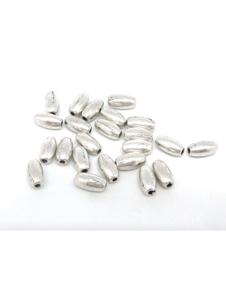 20 Perles grain de riz, ovale, olive en métal argenté lisse 7,6mm x 4mm