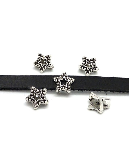 10 Perles passant étoile travaillée évidée pour lanière de 6mm en métal argenté