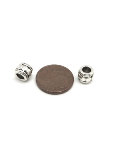Perle tube en métal argenté travaillé 7mm
