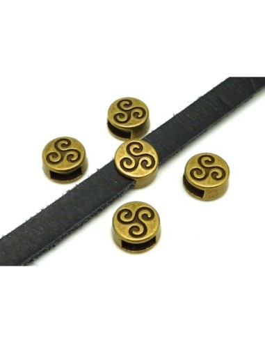 Perle passant triskel pour lanière de 5-6mm en métal couleur bronze 