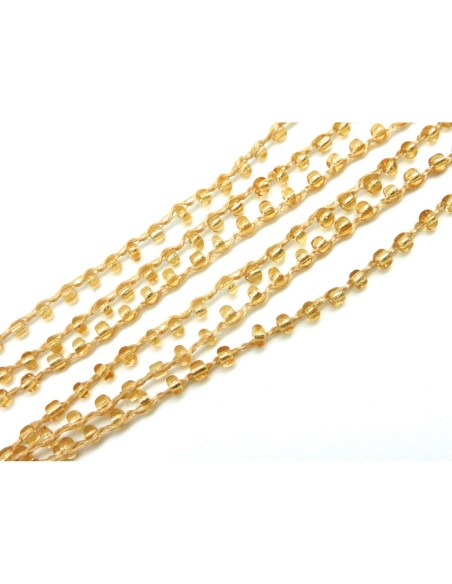 1m de chaînette de rocaille  de couleur doré transparent sur fil de nylon tressé, rocailles en verre 2,3mm