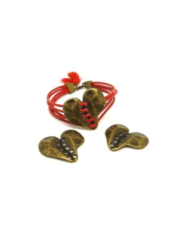 2 coeurs connecteurs à 10 trous, un lacet peut être inséré en métal de couleur  bronze