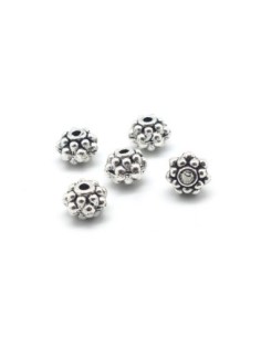 Perle en métal argenté intercalaire 6,7mm travaillé style ethnique