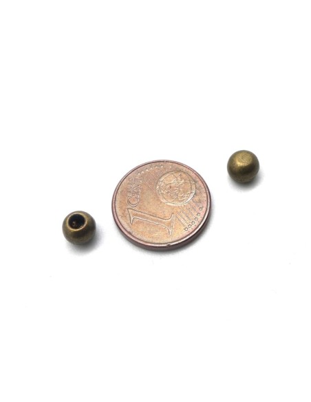 Perle de finition pour cordon de 2 - 2,5mm en métal couleur bronze