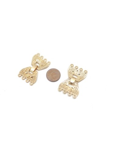 Fermoir à 4 rangs en métal doré travaillé filigrane