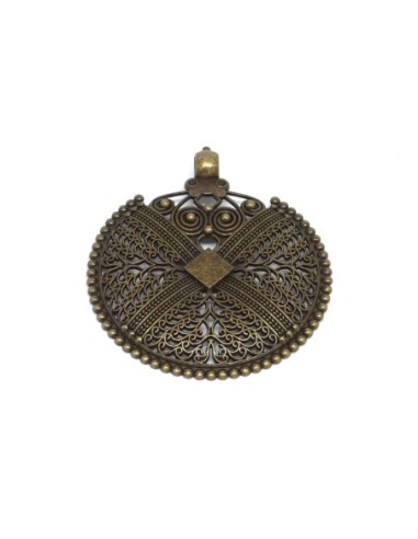 Pendentif style ethnique en métal travaillé filigrane de couleur bronze