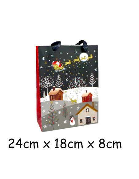 Pochette cadeau papier cartonné glacé motif village de nuit enneigé et Père Noël dans son traineau doré, rouge sur fond noir