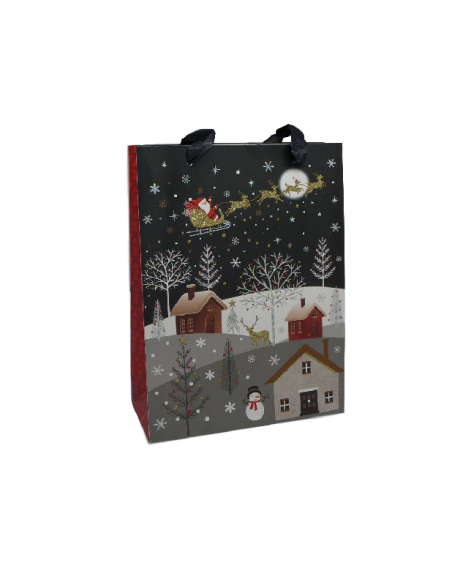 Sac cadeau papier cartonné glacé motif village de nuit enneigé et Père Noël dans son traineau doré, rouge sur fond noir