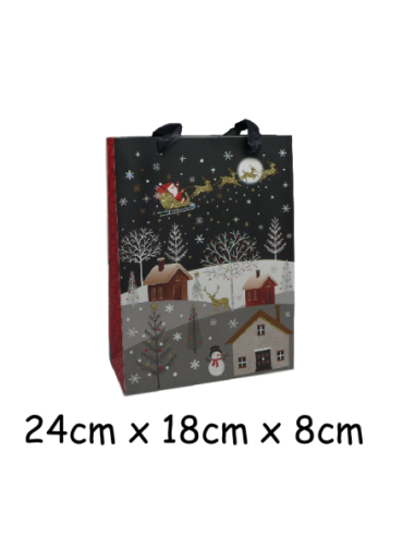 Pochette cadeau papier cartonné glacé motif village de nuit enneigé et Père Noël dans son traineau doré, rouge sur fond noir