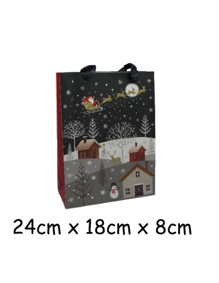 Pochette cadeau papier cartonné glacé motif village de nuit enneigé et Père Noël dans son traineau doré, rouge sur fond noir