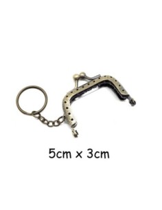 Fermoir porte monnaie en métal travaillé de couleur bronze 5cm avec attache porte clé