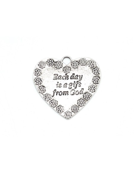 Pendentif coeur argenté avec motif fleur en métal
