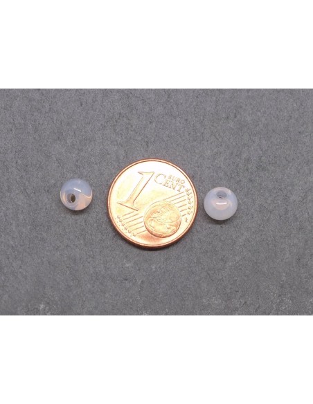 Perle goutte 6mm, trou décentré rose pâle translucide