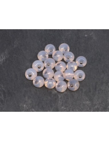 Perle ronde 6mm en verre, trou décentré rose pâle translucide