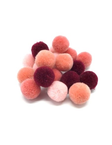 Pompon rond rose pour finition de drap de plage