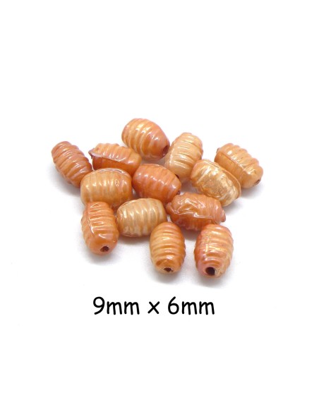 Perle tube strié orange abricot irisé 9mm x 6mm en verre