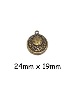 breloque médaillon en métal de couleur bronze martelé, sequin motif frise