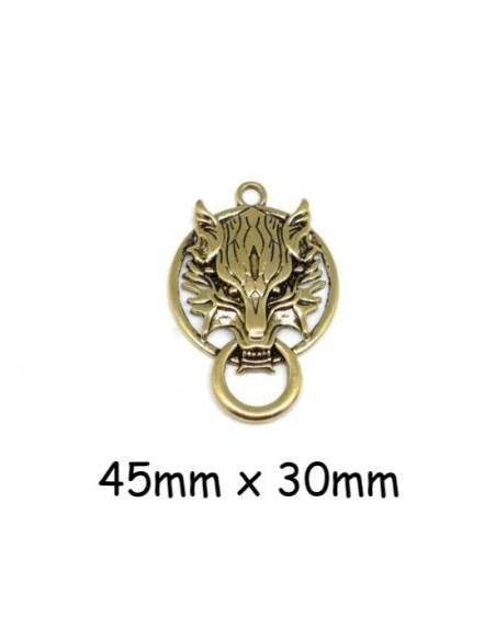 Pendentif tête de loup doré en métal travaillé