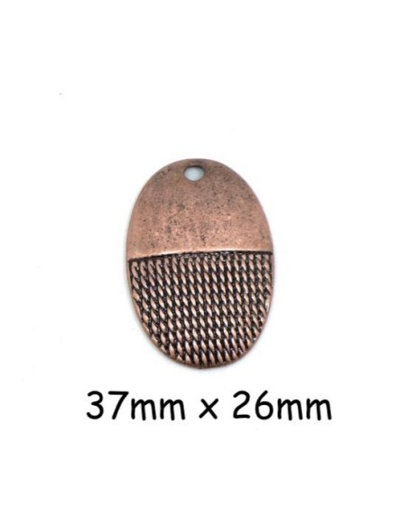 Pendentif ovale cuivré en métal lisse et texturé