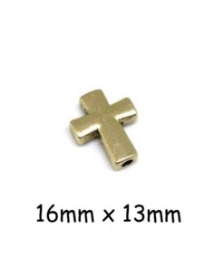 Perle croix doré pâle en métal lisse pour cordon cuir 2mm