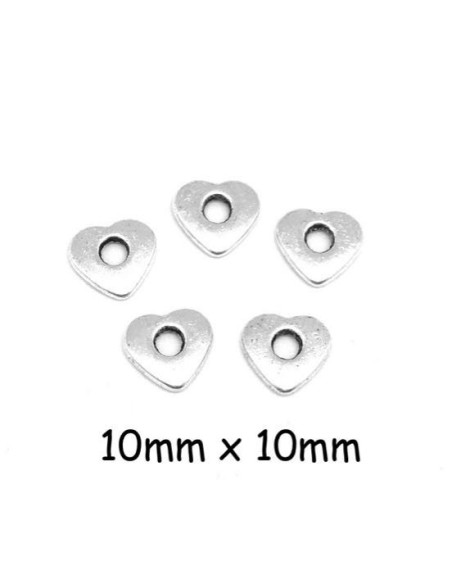 Perle rondelle forme coeur argenté en métal