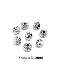 Perle toupie gravé de petits ronds en métal argenté pour cordon 2mm