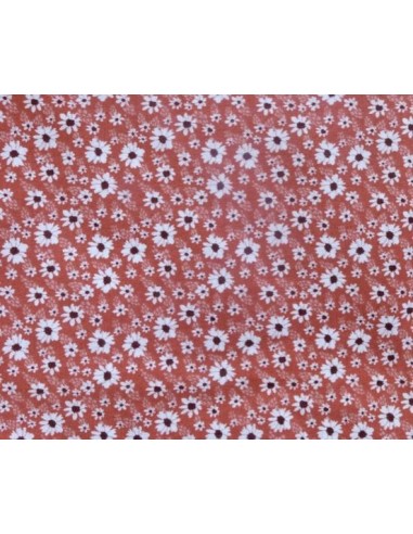 Tissu coton motif fleur blanche sur fond rouge rosé mat - vendu au mètre